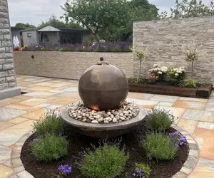 atlas with bronze ball
